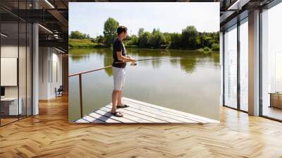 Man fishing from the bridge Wall mural