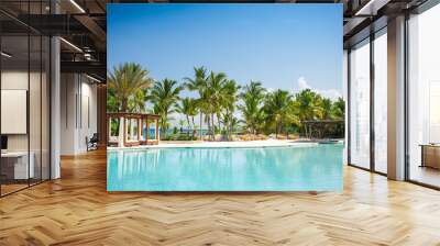 Outdoor Swimming pool of luxury hotel resort near the sea Wall mural