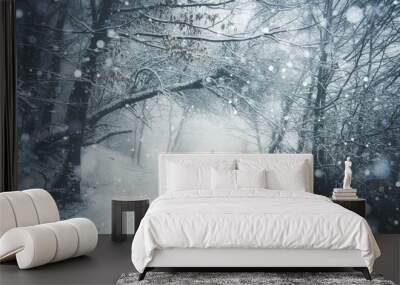 man on snowy path in forest winter journey Wall mural