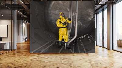 man in chemical suit Wall mural