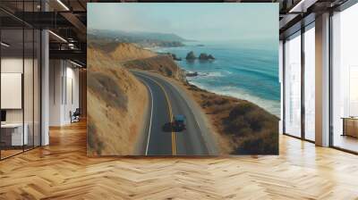 Black car driving up pacific coast highway big sur california Wall mural