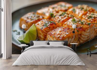 Delicious grilled salmon with soy sauce, sesame seeds and lime on plate Wall mural