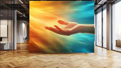 Hand reaching out from heaven with golden and blue light background Wall mural