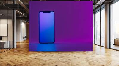 Smartphone showing blue screen standing on violet background with copy space Wall mural