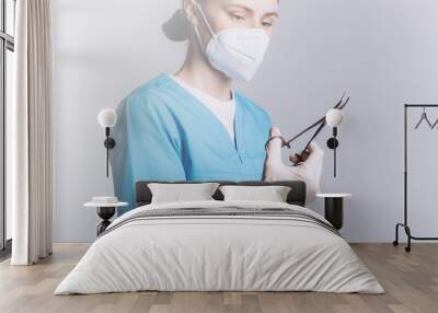 Woman doctor in medical mask in laboratory on isolated background. Protection, epidemic, medicine, health care lifestyle concept Wall mural