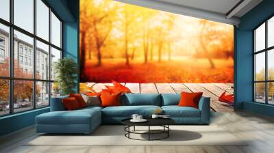 orange fall  leaves and old wooden board, autumn natural background Wall mural