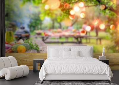 summer time party in backyard garden with grill BBQ and vegetables, wooden table, blurred background Wall mural