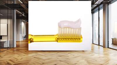 Close up of a toothbrush with toothpaste isolated on a white background with space for copy Wall mural