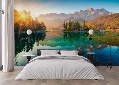 impressive summer sunrise on eibsee lake with zugspitze mountain range. sunny outdoor scene in germa Wall mural