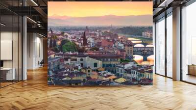 Panoramic evening cityscape of Florence, Italy, Europe. Beautiful medieval arched river bridges over Arno river.Traveling concept background. Wall mural