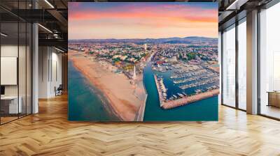 Panoramic summer view from flying drone of Libera Rimini public beach. Captivating evening scene of Italy, Europe. Colorful sunset on Adriatic coast. Vacation concept background. Wall mural