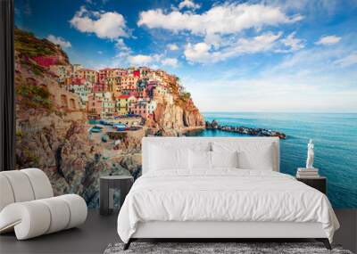 Second city of the Cique Terre sequence of hill cities - Manarola. Colorful spring morning in Liguria, Italy, Europe. Picturesqie seascape of Mediterranean sea. Traveling concept background. Wall mural