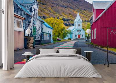 SEYDISFJORDUR, ICELAND, JULY 26, 2018: Empty street of Seydisfjordur town. Colorful morning scene of East Iceland, Europe. Wall mural