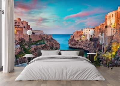 Spectacular spring cityscape of Polignano a Mare town, Puglia region, Italy, Europe. Colorful evening seascape of Adriatic sea. Traveling concept background.. Wall mural