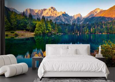 Tranquil morning scene of Fusine lake. Captivating summer sunrise in Julian Alps with Mangart peak on background, Province of Udine, Italy, Europe. Beauty of nature concept background. Wall mural