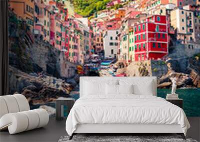 Vertical virew of first city of Cique Terre sequence of hill cities - Riomaggiore. Bright morning view of Liguria, Italy, Europe. Splendid seascape of Mediterranean sea. Travel the world. Wall mural