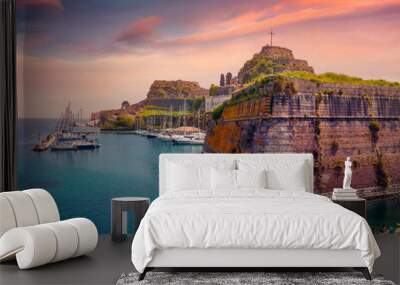 Сharm of the ancient cities of Europe. Picturesque cityscape of Corfu Town, capital of the Greek island of Corfu, Greece, Europe. Sunny summer sunrise of Old Venetian Fortress (Paleo Enetiko Frourio). Wall mural