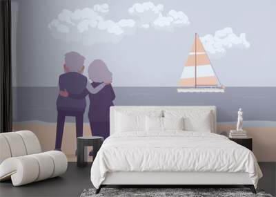 Active seniors, elderly people standing on beach in hug, rear. Couple of older adults enjoying ocean, sea, sailboat view together, romantic reminiscence. Beautiful seascape nature scenery background Wall mural