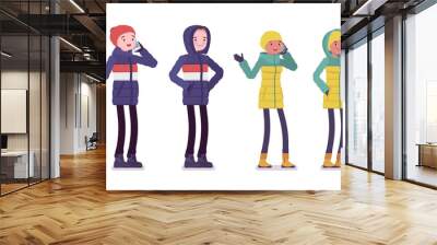 Young man and woman in down jacket standing, phone talking, wearing soft warm winter clothes, classic snow boots, hat. Vector flat style cartoon illustration isolated on white background Wall mural