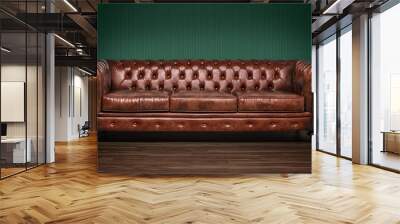 Brown chesterfield sofa with green wallpaper background Wall mural