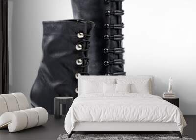 two female boots over white background Wall mural