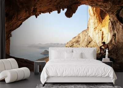 Two rock climbers having a rest. Kalymnos Island, Greece. Wall mural