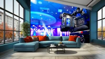 broadcast video camera to show what is happening on stage on large screens.  Wall mural