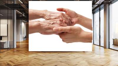 Hands of an elderly man holding the hand of a younger woman Wall mural