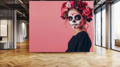 cute child girl with skull makeup on day of dead holiday isolated on colored background Wall mural