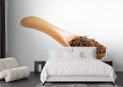 Dried cumin seeds in a wooden spoon on a white background. A cooking seasoning popular in the cuisine of Asia and the Middle East Wall mural