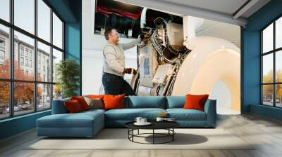 engineer of the magnetic resonance imaging apparatus configure the scanner. Wall mural