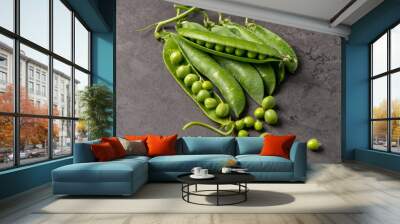 fresh green peas on a dark background Wall mural