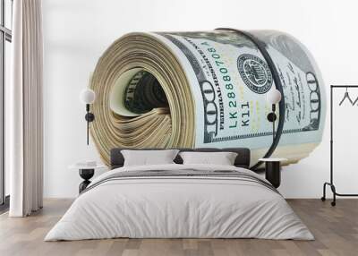 A large roll of hundred dollar bills knitted by a black rubber band isolated on white background. Wall mural