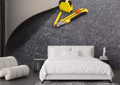 Workplace when laying carpet - finishing work floor covering - copy space Wall mural