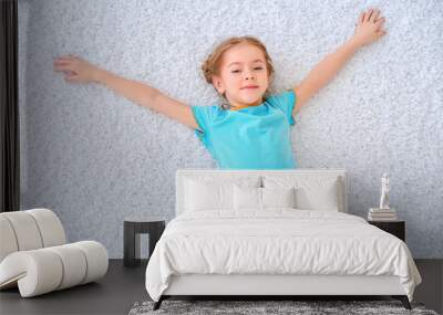 child on a carpet Wall mural