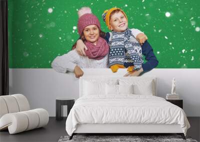 children in winter clothes Wall mural