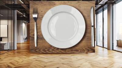 white empty dinner plate setting on wooden table Wall mural