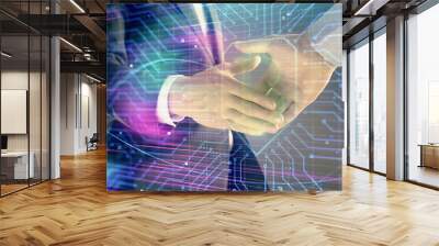 Multi exposure of bitcoin sign on abstract background with two men handshake. Concept of cryptocurrency Wall mural