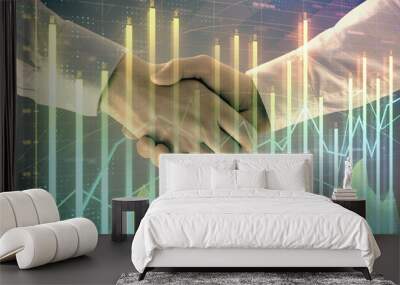 Multi exposure of forex graph on abstract background with two businessmen handshake. Concept of success on stock market Wall mural