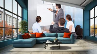 Businessman Giving Presentation Wall mural