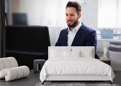 Businessman Using Computer Wall mural