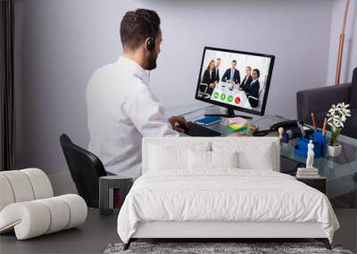 Businessman Video Conferencing On Computer Wall mural