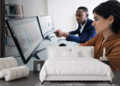 Businesspeople Checking Spreadsheet On Screen Wall mural