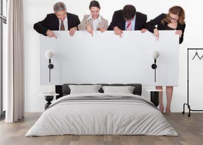 Businesspeople holding a blank banner Wall mural