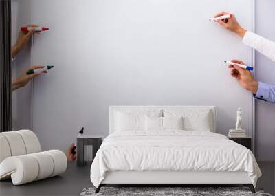 Businesspeople Writing On Blank White Board Wall mural