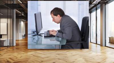 Concentrated Businessman Working On Computer In Office Wall mural