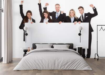 confident businesspeople holding blank banner Wall mural