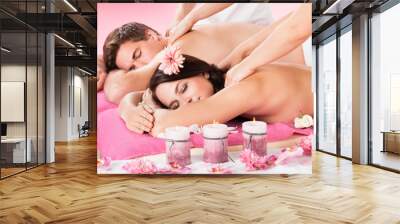 Couple Receiving Shoulder Massage At Spa Wall mural