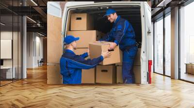 Delivery Men Unloading Boxes From Truck Wall mural