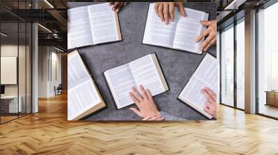 Elevated View Of People Reading Holy Books Wall mural